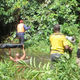 Wading through swamps in Nouabalé Ndoki National Park.